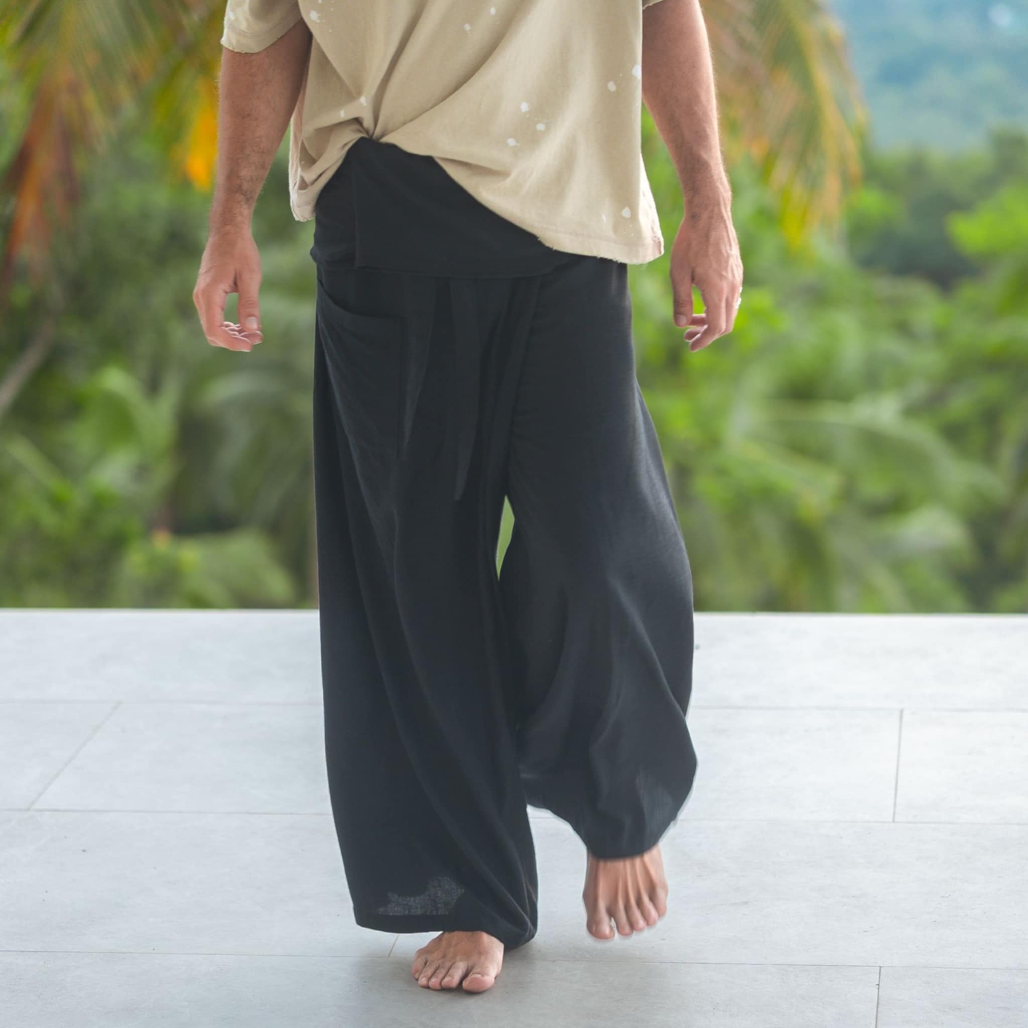Black Thai fisherman pants made from a breathable hemp and cotton blend, ideal for yoga retreats, summer festivals, casual boho wear, and relaxed hippie style.