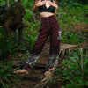 Burgundy maroon elephant print warm harem blanket pants with smocked waistband and side pockets, soft cashmilon fleece-style trousers for yoga, lounging and festivals