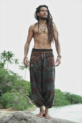 Men's alternative charcoal stonewashed razorcut pants with a rust orange underlayer and relaxed drop crotch silhouette.