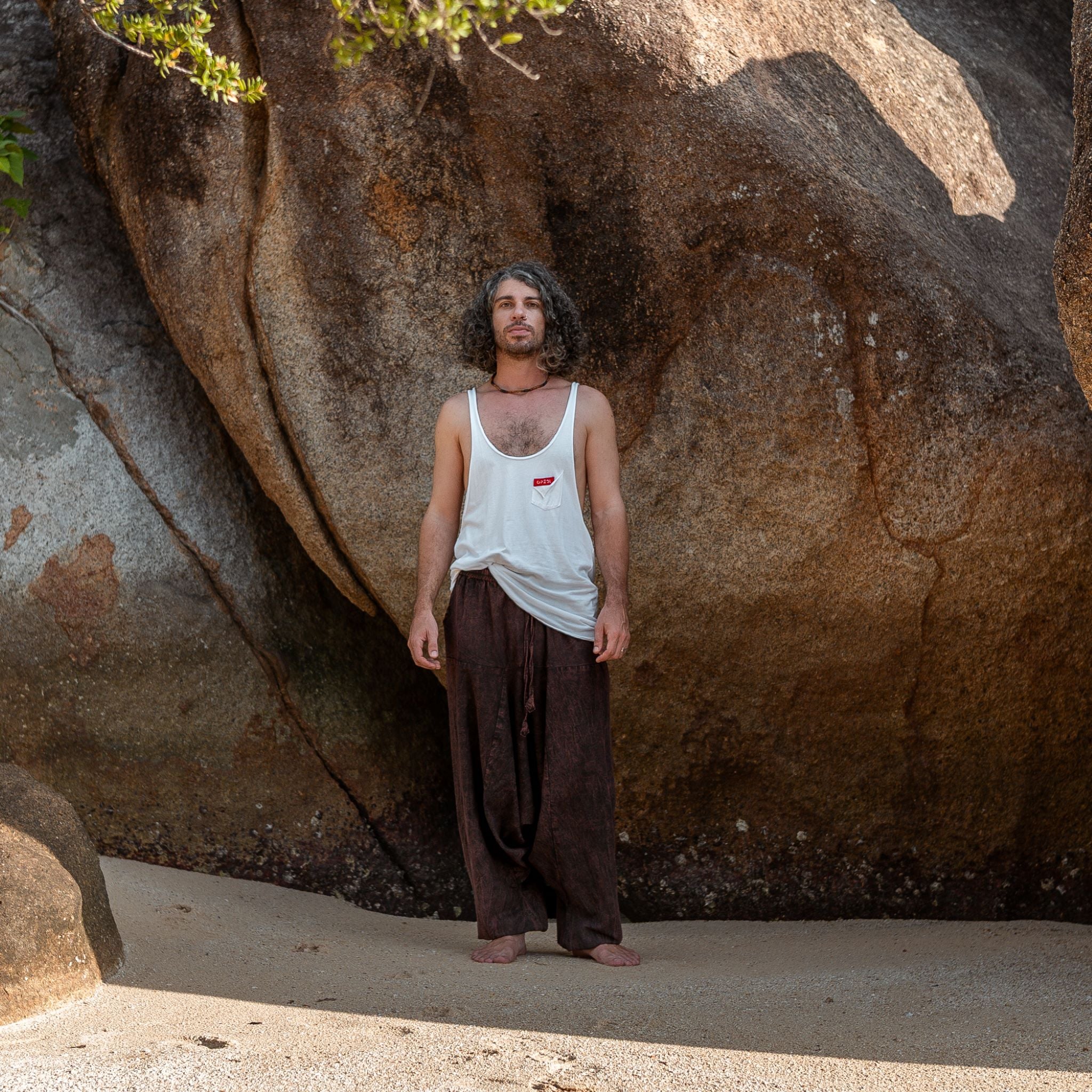Men's brown stonewashed drop crotch harem pants, full length view — boho festival trousers