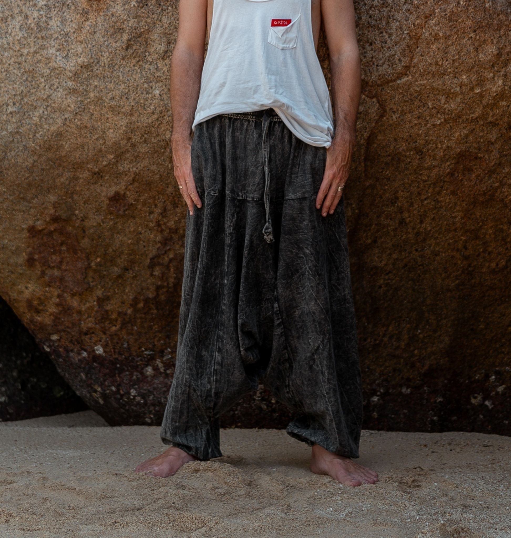 Men's charcoal grey stonewashed drop crotch harem pants, full length front view, boho festival trousers
