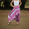 Pink and white mandala harem pants with relaxed low crotch design, lightweight boho yoga trousers for festivals, dance, and everyday hippie style
