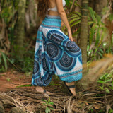 Turquoise and white mandala harem pants with relaxed low crotch design, lightweight boho yoga trousers for festivals, dance, and hippie style comfort