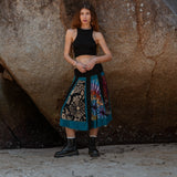 Front view of an artisan patchwork psy skirt with bohemian and tribal inspired designs